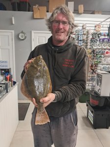 Clive Leythorne with a Flounder of 2lb 12oz 4dr